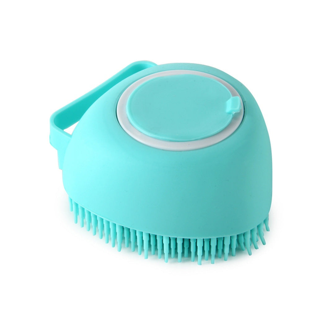 Blue silicone dog bath brush with massage bristles and shampoo dispenser