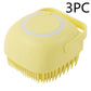 Yellow silicone dog bath massage brush with soft bristles and handle
