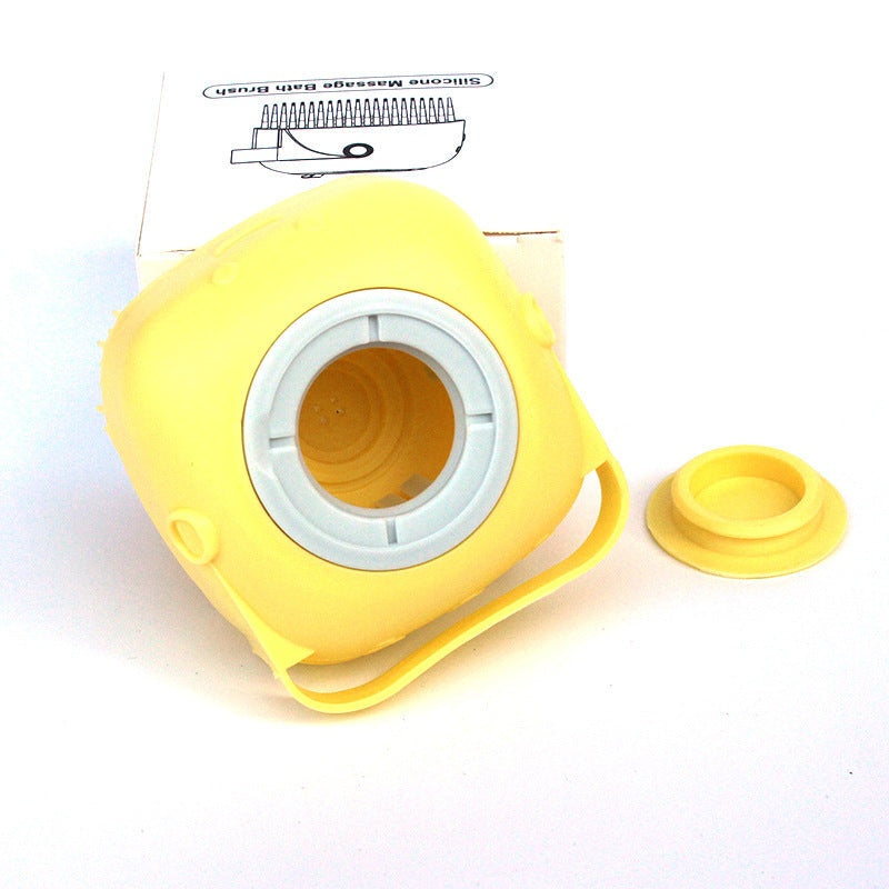 Yellow silicone dog bath massage glove with shampoo dispenser opening and removable cap on white background