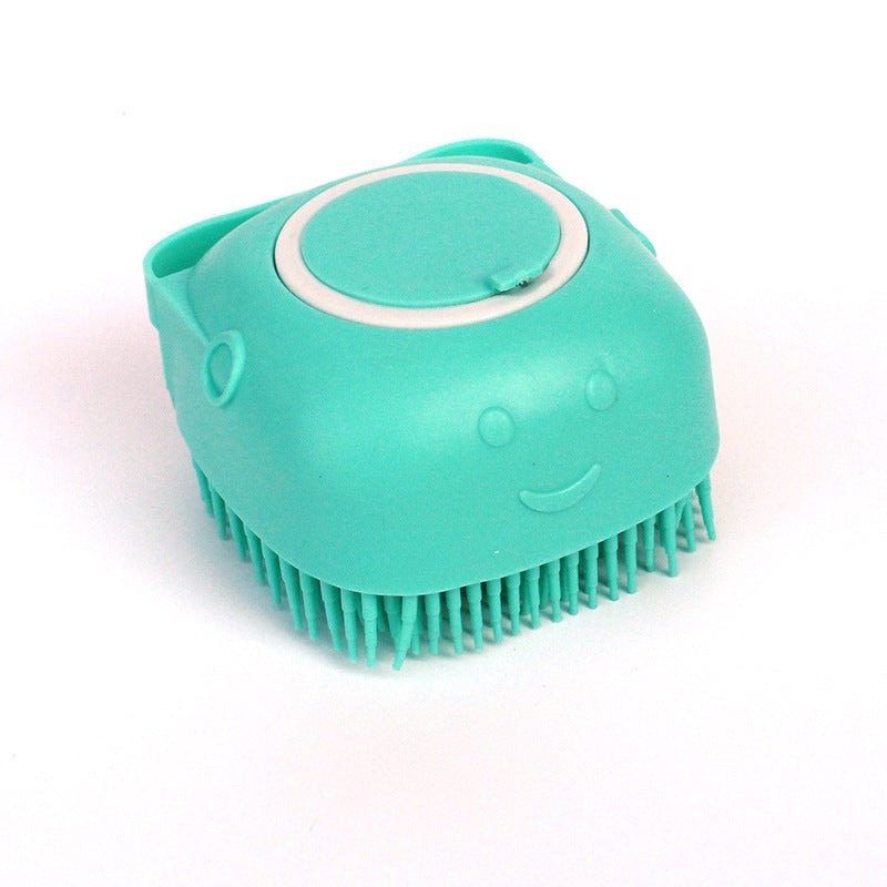 Silicone dog bath massage glove in turquoise with soft bristles for gentle pet grooming and shampoo dispensing